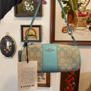 Coach Nikita barrel bag in signature jacquard faded blue teal